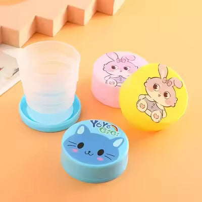 100ML Folding Cup with Lid – Portable Collapsible Plastic Drinking Cup | Reusable Travel & Outdoor Cup | Cartoon Design | Compact Mouthwash & Water Cup – Only Rs. 99